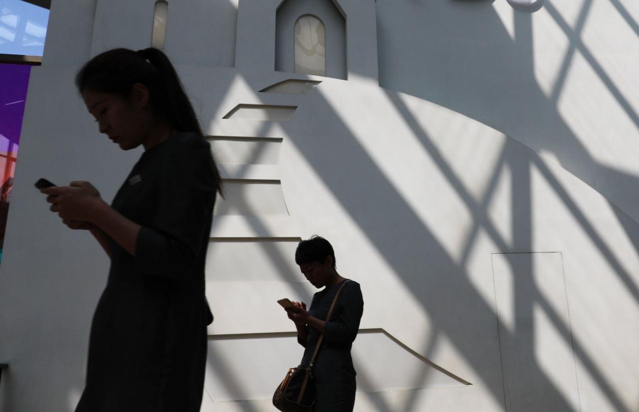 Mobile phones, social media and lax online regulations make it all too easy for young people to access pornography. Photo: EPA